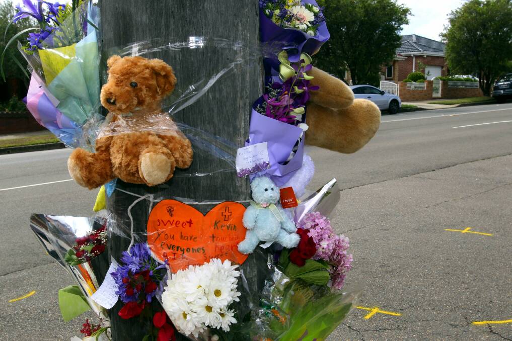 Residents leave floral and toy tributes for Kevin at the scene. Picture: Lisa McMahon