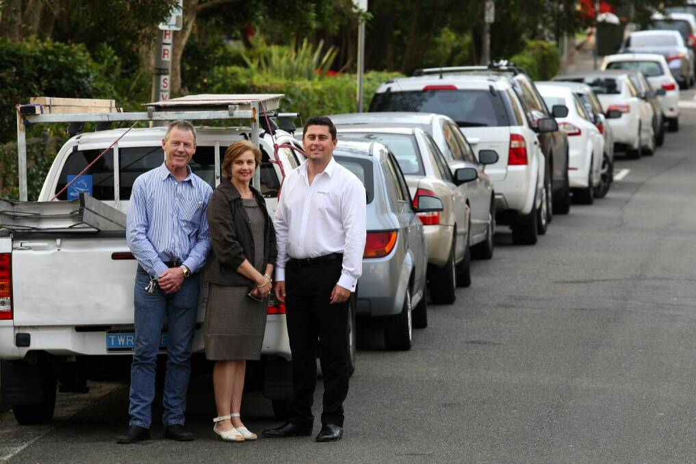 On your mark: (Left to right) Shirebiz representative Tony Blain, Cronulla Chamber of Commerce executive Annette Tasker and Payne Pacific real estate representative Carl Robinson in one of the streets they believe would benefit from determined parking. Picture: John Veage