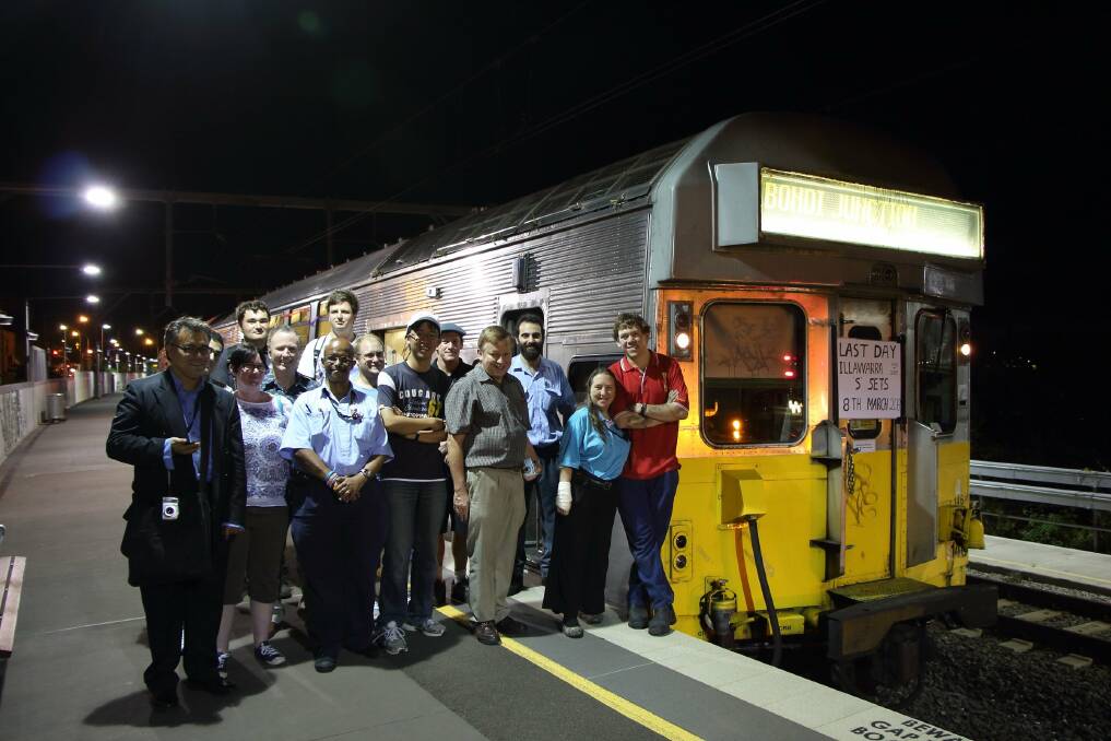 End of line: Rail enthusiasts, at Cronulla station, farewell the last S-set train to run on the Illawarra line. Picture: Steven Walker