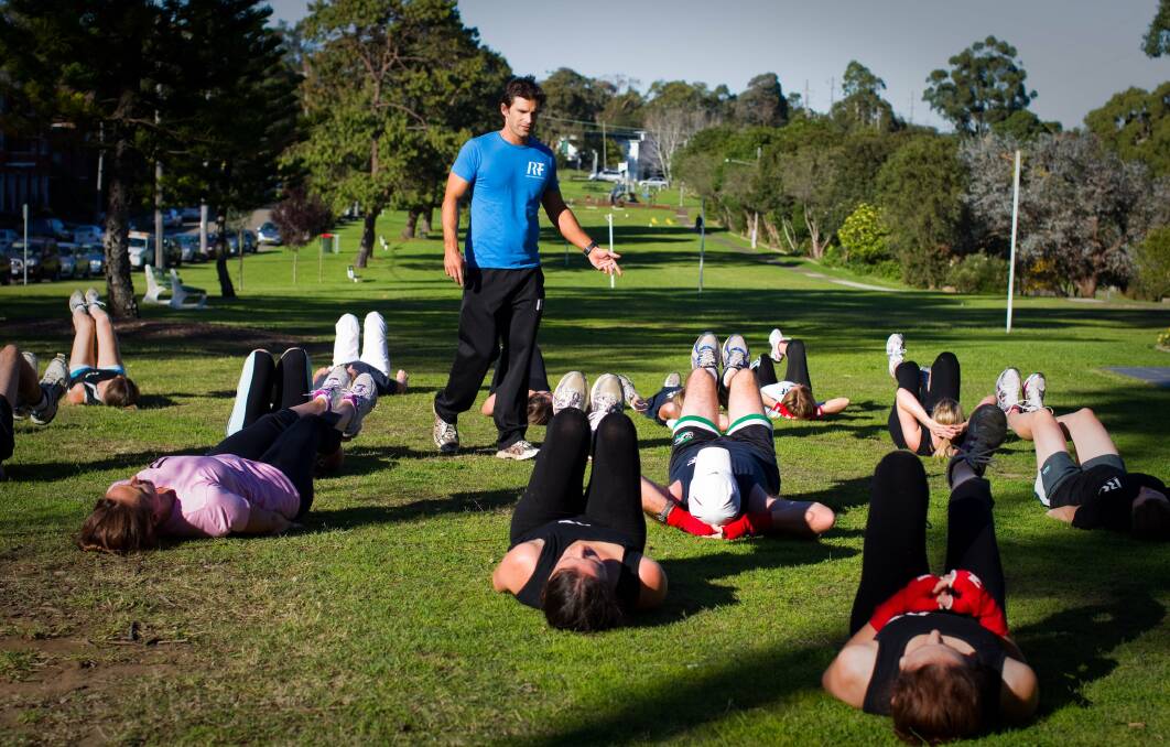 Regulated approach: Trainer Sean Connell and the Real Results Fitness group at Oatley Memorial Park. Like many outdoor fitness users, Sean is happy with the way the councils do things. Picture; supplied