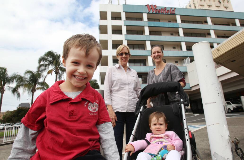 Welcome changes: Spencer Wallis, 4, and his sister Peyton, 1, with their mother N’dene and grandmother Kerry Clifford at Westfield Miranda. Picture John Veage