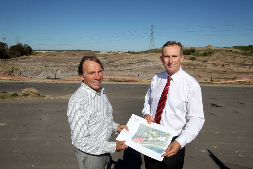 Field of dreams: Tom Breen (left) and Australand NSW residential general manager Nigel Edgar on the site of future sporting fields.
