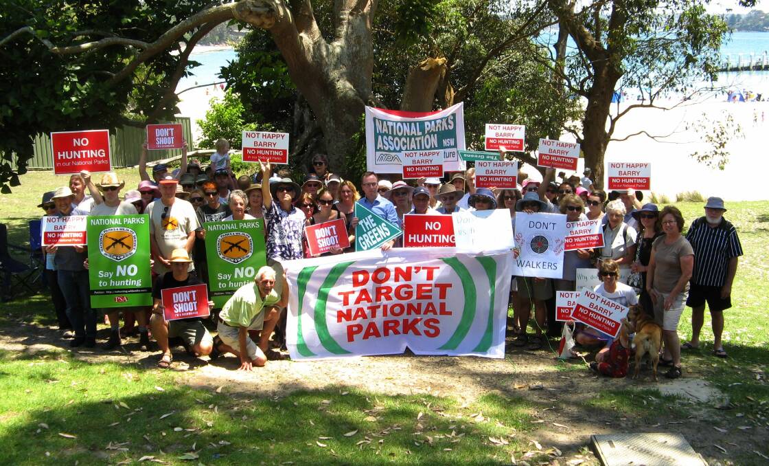 Sending a message: About 60 people joined a Greens party protest in Bundeena against hunting in national parks.