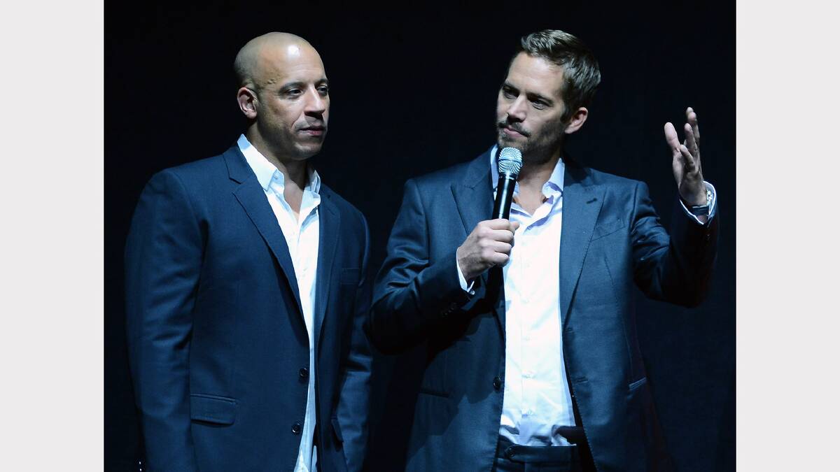 Vin Diesel (L) and Paul Walker attend a Universal Pictures presentation to promote their upcoming film "Fast & Furious 6" at The Colosseum at Caesars Palace during CinemaCon, the official convention of the National Association of Theatre Owners, on April 16, 2013 in Las Vegas, Nevada.  (Photo by Ethan Miller/Getty Images)	