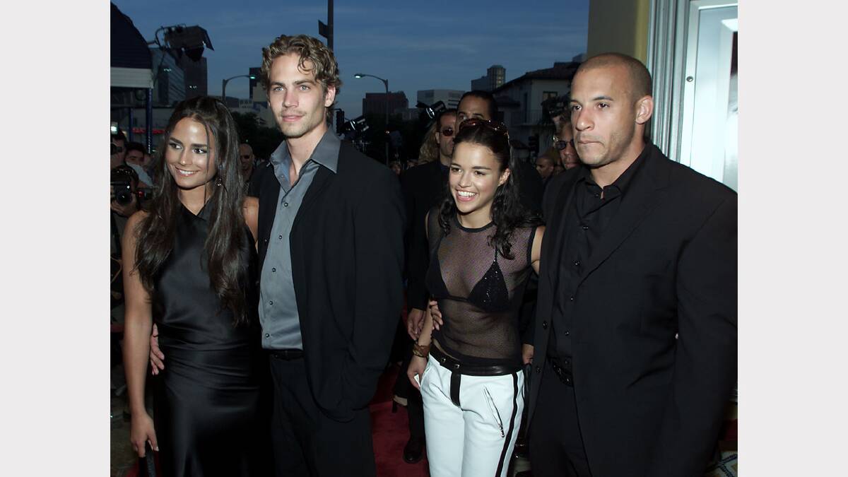 Walker with his fellow cast members Jordana Brewster, Michelle Rodriguez and Vin Diesel before the premiere of their film 'The Fast and the Furious' at Mann Village Theatre in Los Angeles, CA., Monday, June 18, 2001. 