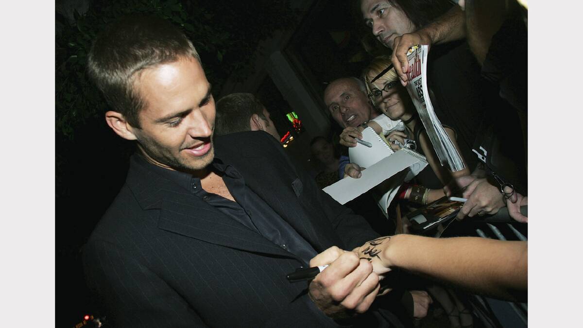 Paul Walker attends the premiere of Sony Pictures "Into the Blue" at the Mann Village Theatre on September 21, 2005 in Westwood, California. 