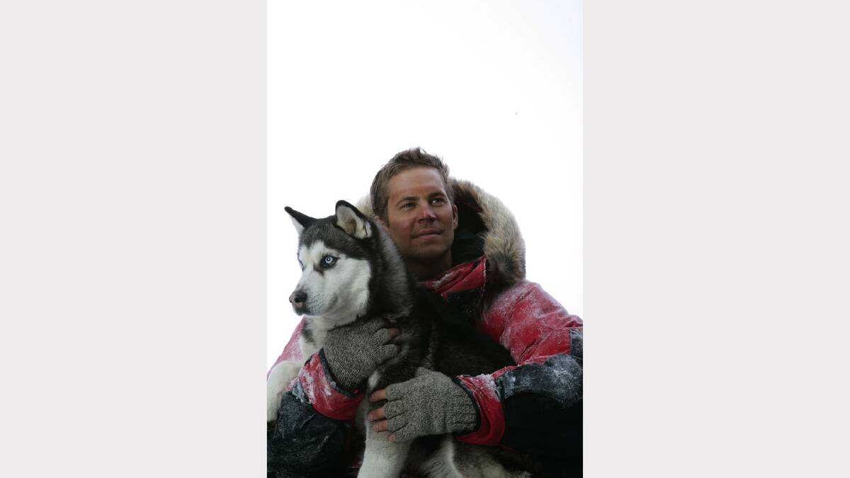 Jerry (played by Paul Walker) and Max the dog in a scene from Disney's Eight Below.