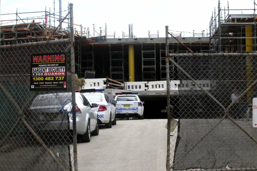 Builder dies: A man believed to aged in his 50s died after falling off a construction site at Mortdale this morning. Picture: Jane Dyson.  