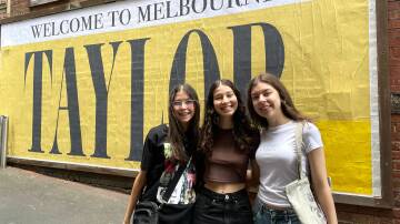 Bianca and Georgia Carrocci, with Sienna Sims, from Perth, in Melbourne's AC/DC lane. Picture by Anna McGuinness 