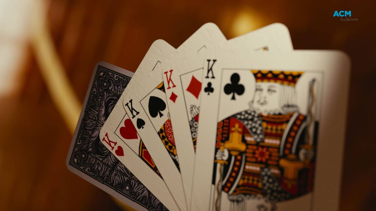 Four of a kind in a hand of playing cards. Picture via Canva