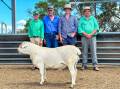 Matt Campion, Nutrien, Dubbo, David and Harry Packer, Merino Downs, Surat, and Brad Wilson, Nutrien, Dubbo, with the top-priced ram which sold for $6500. Picture by Elka Devney