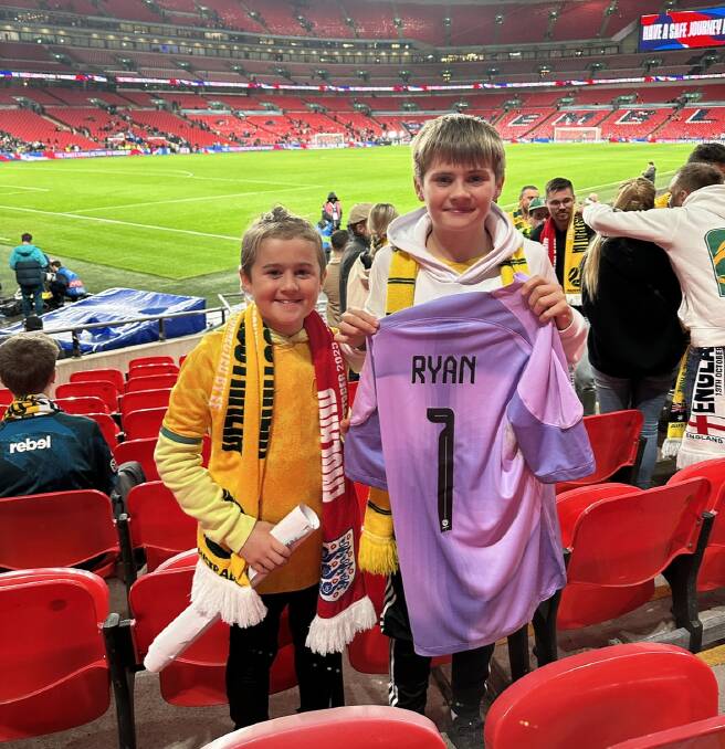 Alfie Edwards and his brother Tyler supporting the Socceroos against England in London. Picture supplied.
