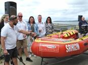Launch: Adam Buckley and Mark Lloyd christening the new IRB. Picture: Supplied.