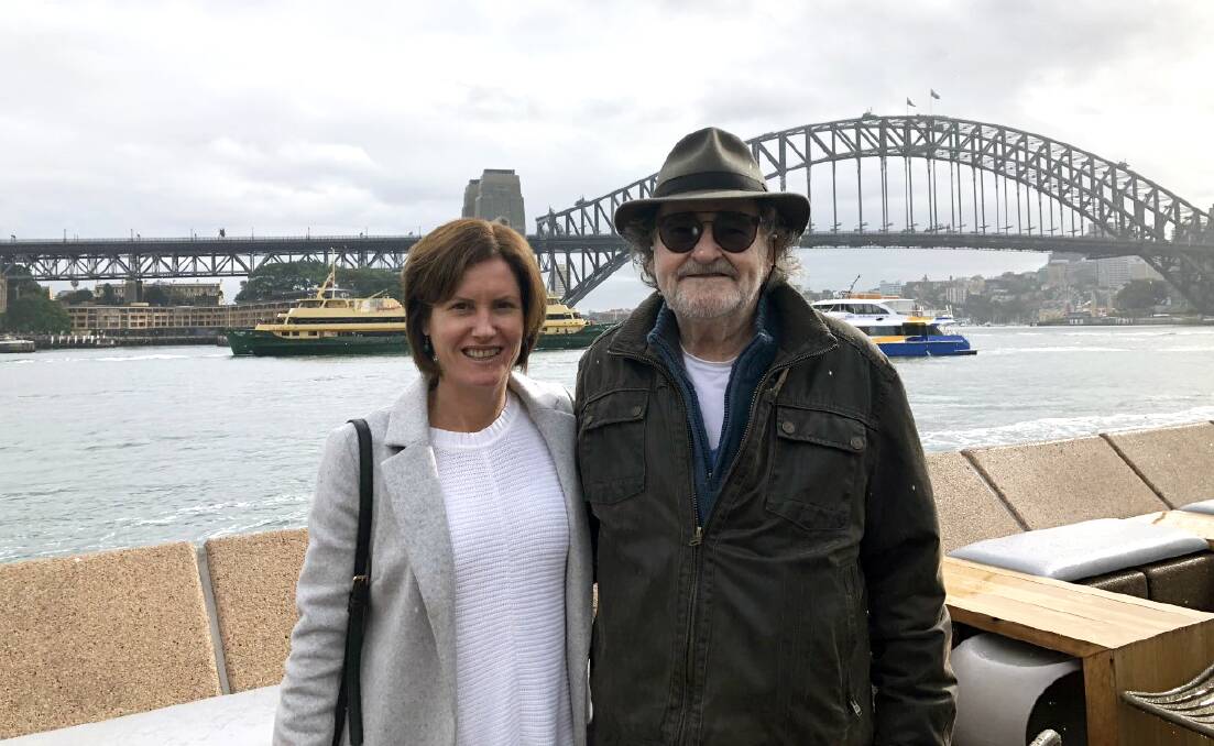 Going the Distance: Fiona Dalton in Sydney Harbour with her dad. Picture: Supplied.