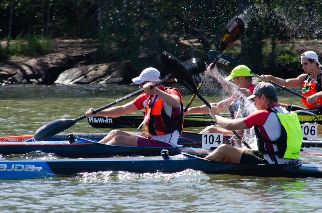 Starting line: Paddlers quickly get off the mark, fighting for the best position in the Woronora Marathon. Picture: Supplied.