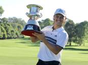 Winner: Harrison Crowe holding the 2022 Golf Challenge NSW Open Champion trophy high. Picture: Supplied.