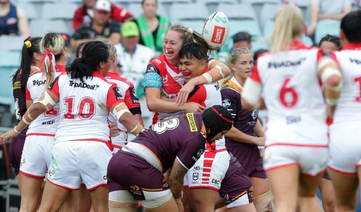 Celebrate: The St George Illawarra Dragons NRLW side playing the Brisbane Broncos in 2019. Picture: Chris Lane.