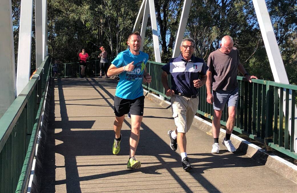 Father and son: David and Lucio D'Alessio running together at a shire Parkrun event. Picture: Supplied.