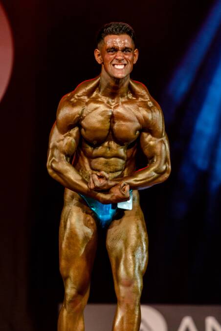 Transformed: Ajay Sharma at his first bodybuilding competition in November, 2020. Picture: Justin Aveling.
