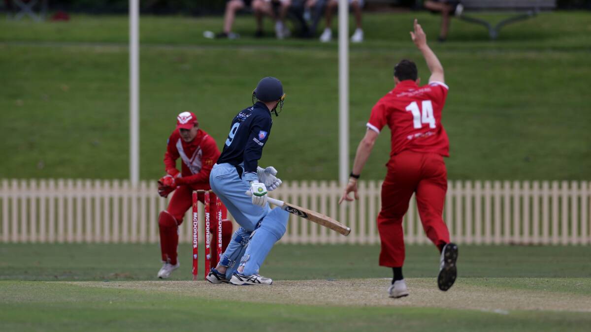 Rivals: St George's Luke Bartier takes the wicket of Sutherland's James Arnold in their Kingsgrove Sports T20 Cup clash. Picture: John Veage.