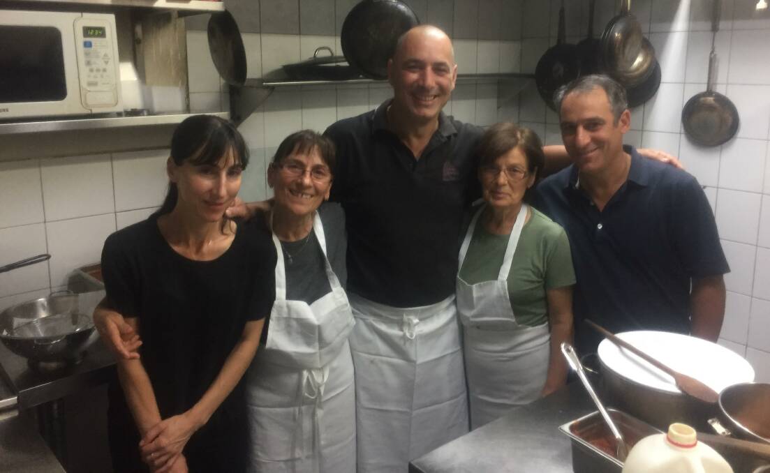 PASSION FOR FOOD: The Roma Pizza restaurant team in the kitchen where dishes are prepared with love. 