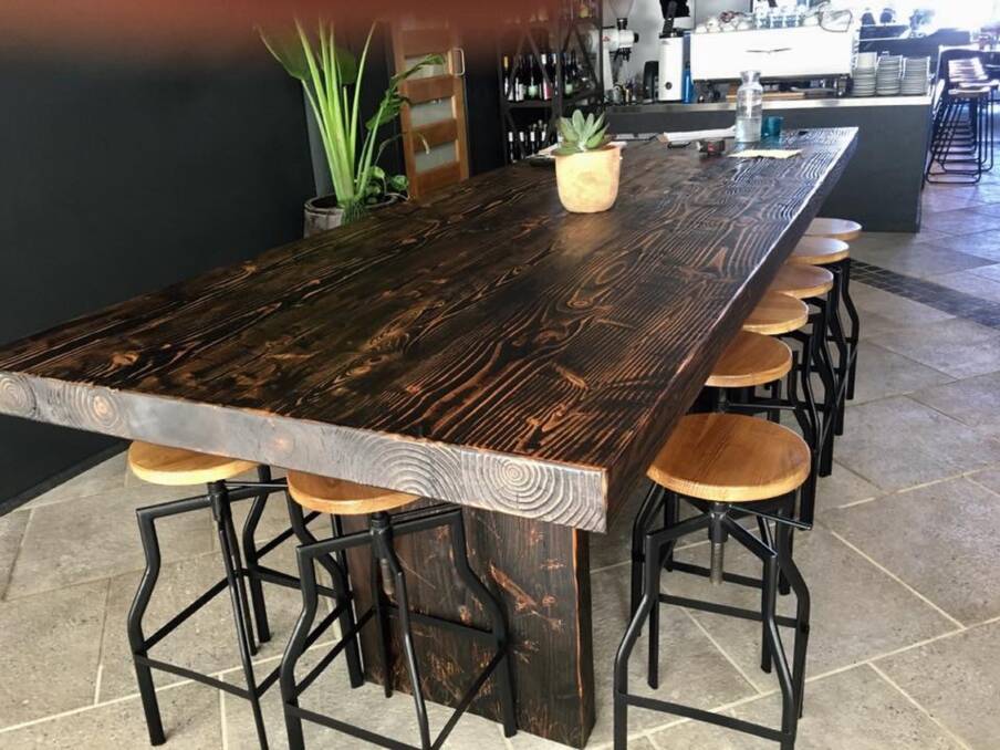 BEAUTIFUL: The design of this table makes full use of the wood's unique grain.
