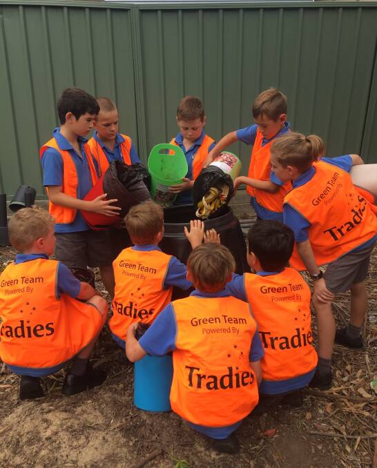DREAM TEAM: Woolooware Public School students work on an environmental project funded by an iPromise grant.