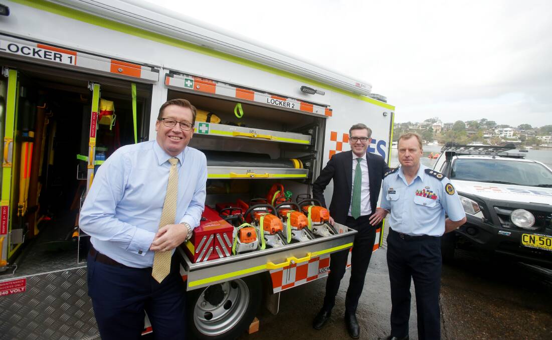 Hurstville SES volunteers go their through the paces for visit by Emergency Services Minister. Pictures: Chris Lane