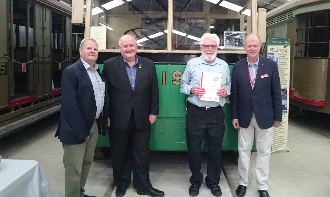On track: Heathcote MP Lee Evans, second from left, has presented volunteers at the Tramway Museum at Loftus with two heritage grants to help them carry out valuable restoration work.