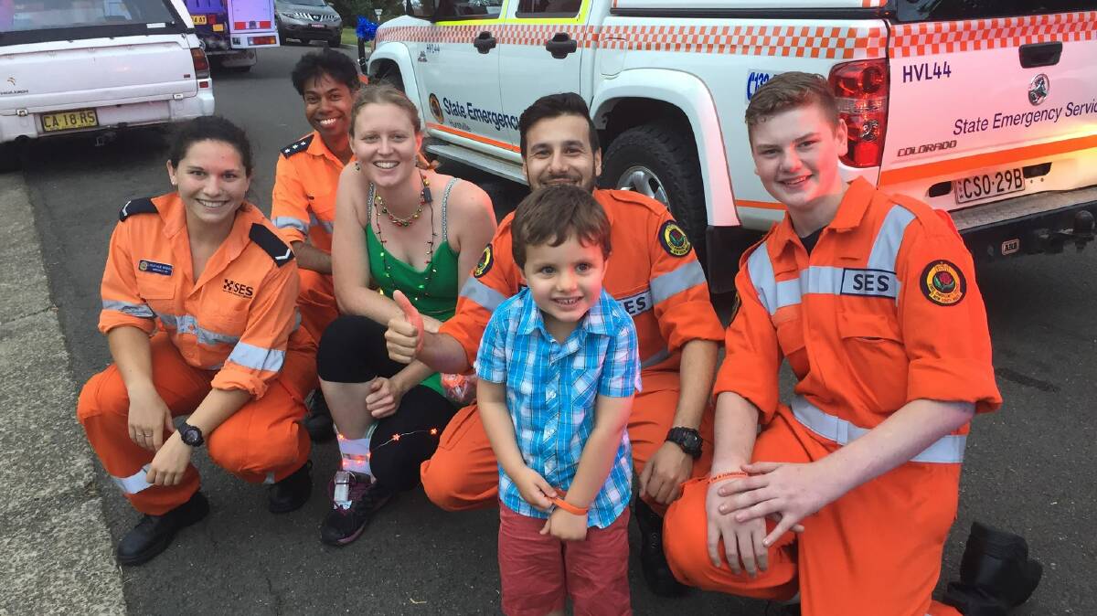 You can be heroes: James, the son of Oatley MP Mark Coure, on a visit to the NSW SES Hurstville Unit.