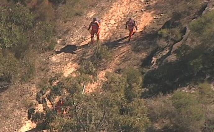Emergency services staff searching the National Park at Heathcote this morning for missing Chinese student Muzi Li. Picture: ABC News