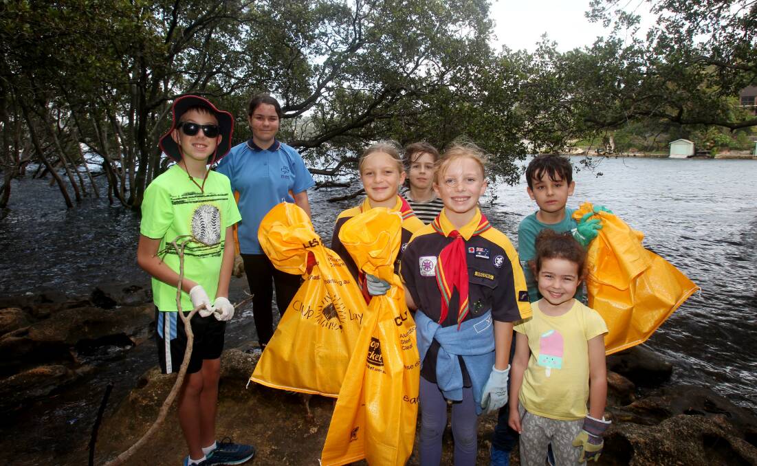 Environmental champions: Members of the 2nd Caringbah Cubs and Scouts and the Caringbah Girl Guides at Kareena Park for Clean Up Australia Day. Picture: Chris Lane