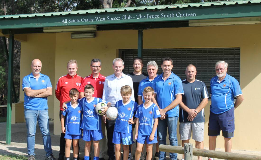Clubhouse upgrade: Banks MP David Coleman, centre, with members of the All Saints Oatley West Soccer Club at Oatley Park.