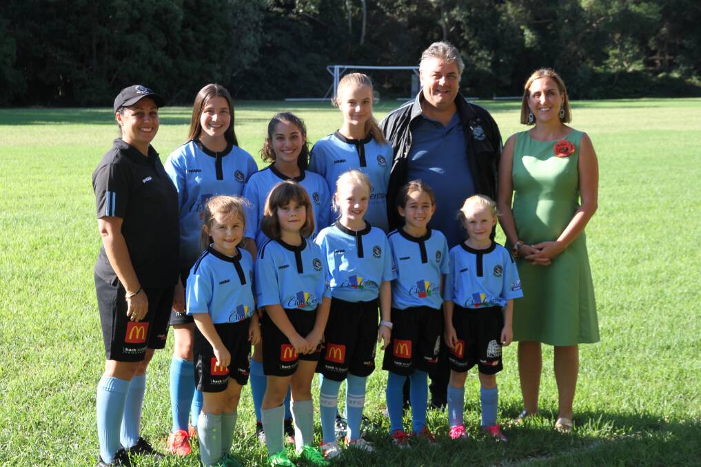 Future fund: Members of the Connells Point Rovers FC with (right) president Steve Matthews and Georges River councillor Sandy Grekas.