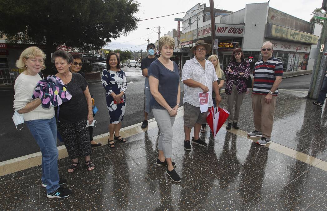 Catherine Ford, centre, with Mortdale residents who are concerned they won't have any input inot the final version of the draft Master Plan for the suburb. Picture: Simon Bennett