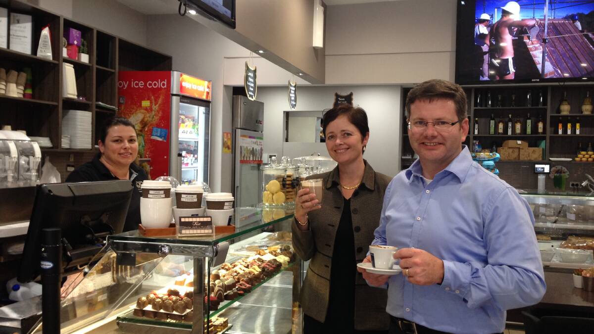 Oatley MP Mark Coure with NSW Minister for Ageing, Tanya Davies (both right) at Poveli Deli Café in Oatley with cafe owner Diana Stojanovski who offers 10 per cent off all food and drinks from Tuesday to Thursday for Senior Card holders.
