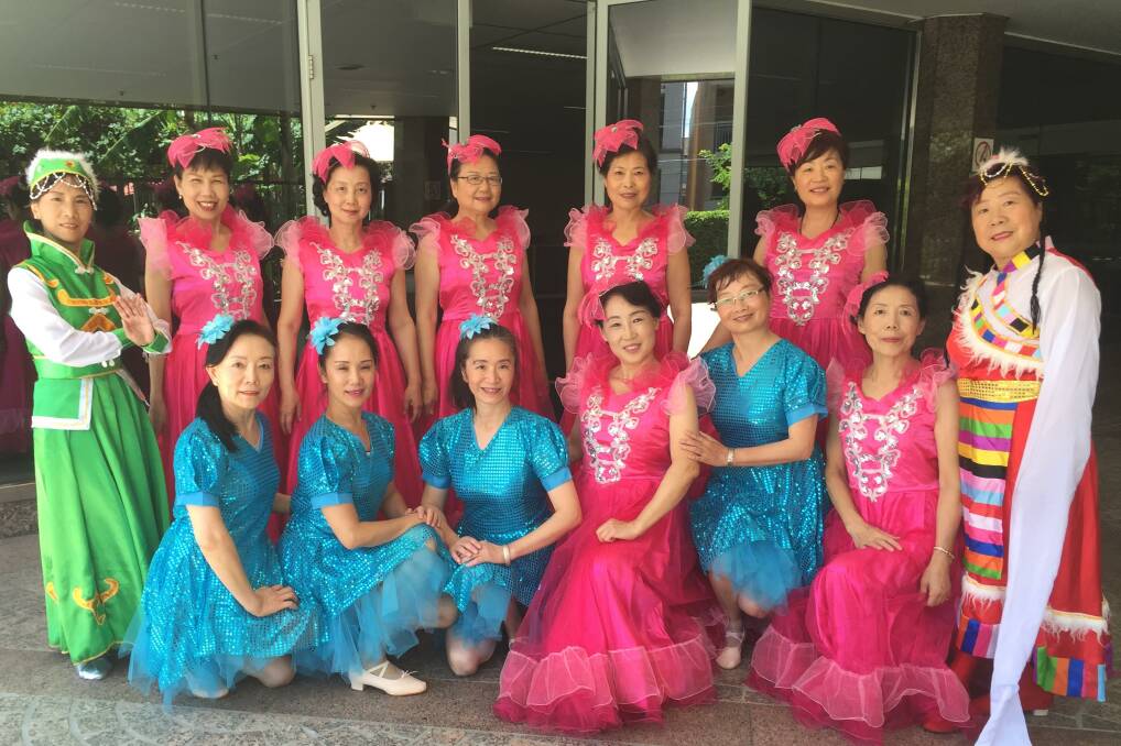 Best foot forward: Members of the Older Asian Women's Dance Group rehearsing for the Lunar New Year celebrations at the St George Community Hall.