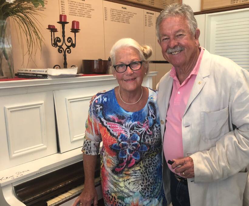 Putting Cronulla in the picture: Ken Done signed a piano for Probus club pianist, Noelene Redman.