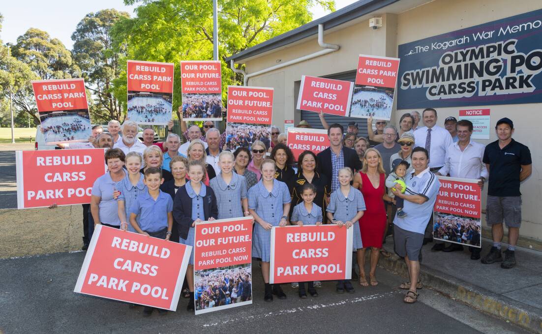 End the uncertainty: Kogarah MP Chris Minns with Carss Park Pool supporters last week.