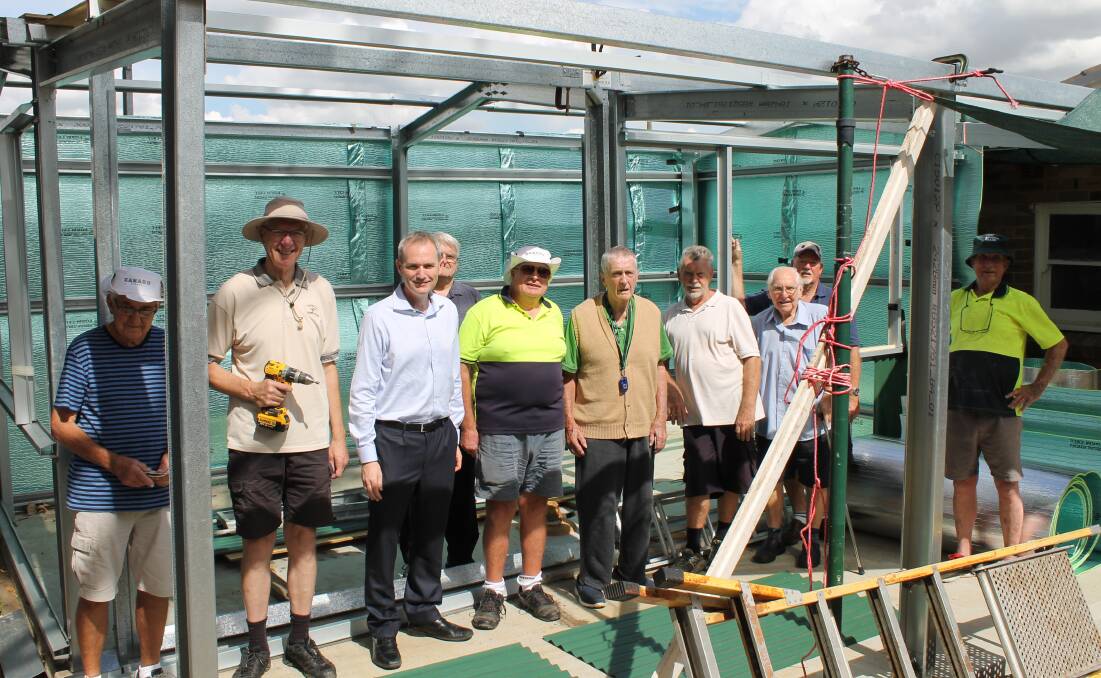 Building community bonds: Banks MP David Coleman with members of the Mortdale Men's Shed who are building their new premises with the help of $9000 in Federal Government funding.