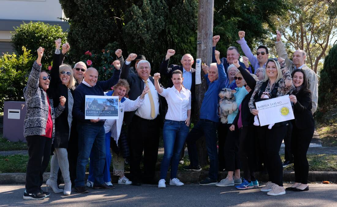 Residents celebrate Telstra's decision not to proceed with a mobile phone small cell installation in Moonbi Place, Kareela. Picture: Jennifer de Witte