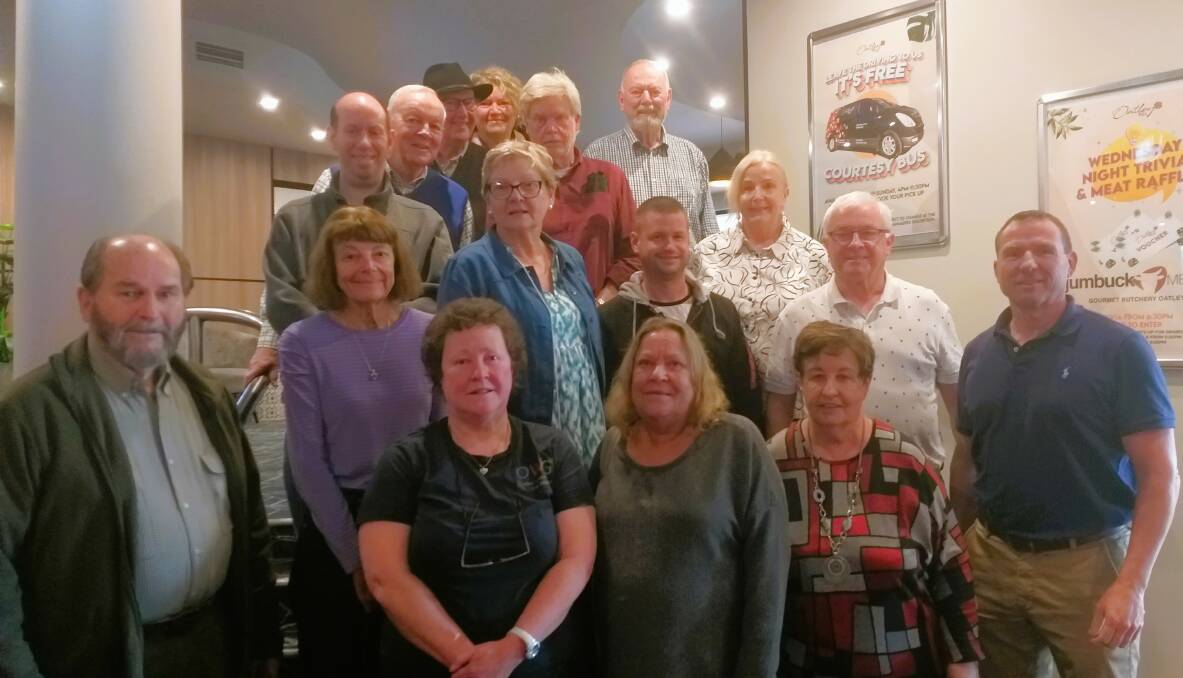 Members of the Oatley Writers' Group at their new meeting venue, the Oatley RSL and Community Club with the club's chief executive officer, Dave Brace on the right.