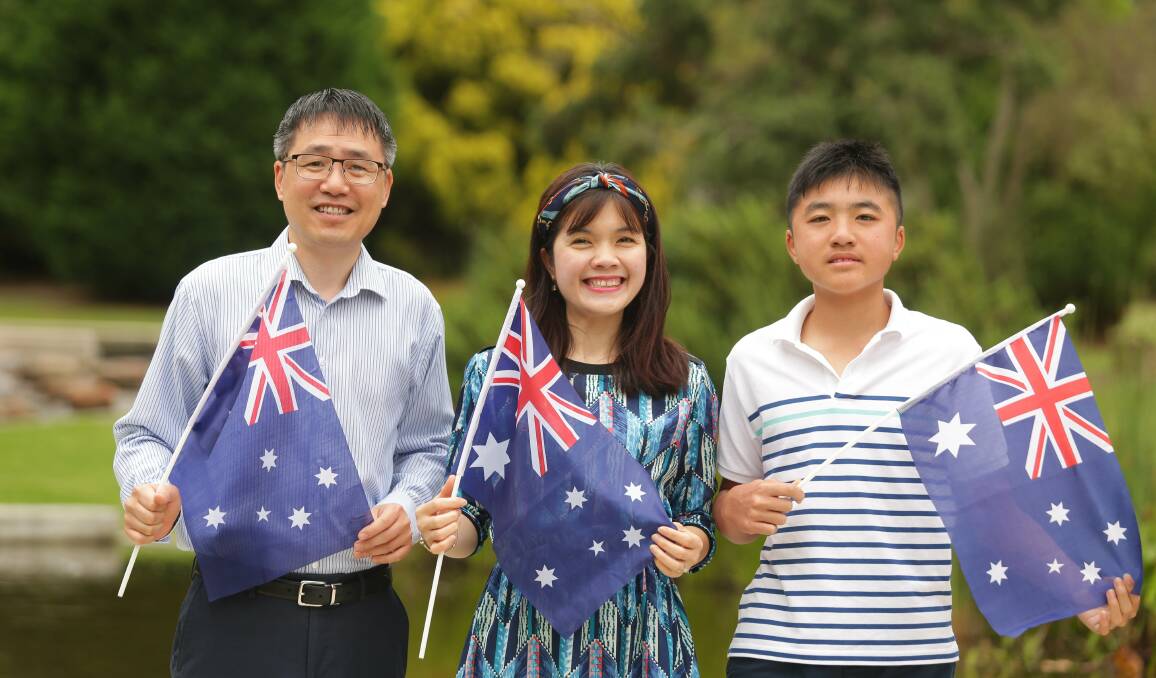 Homeland: Dr Andrew Le, his wife Hien and son, Duc, 15, will become Australian citizens on Australia Day. Picture: Chris Lane