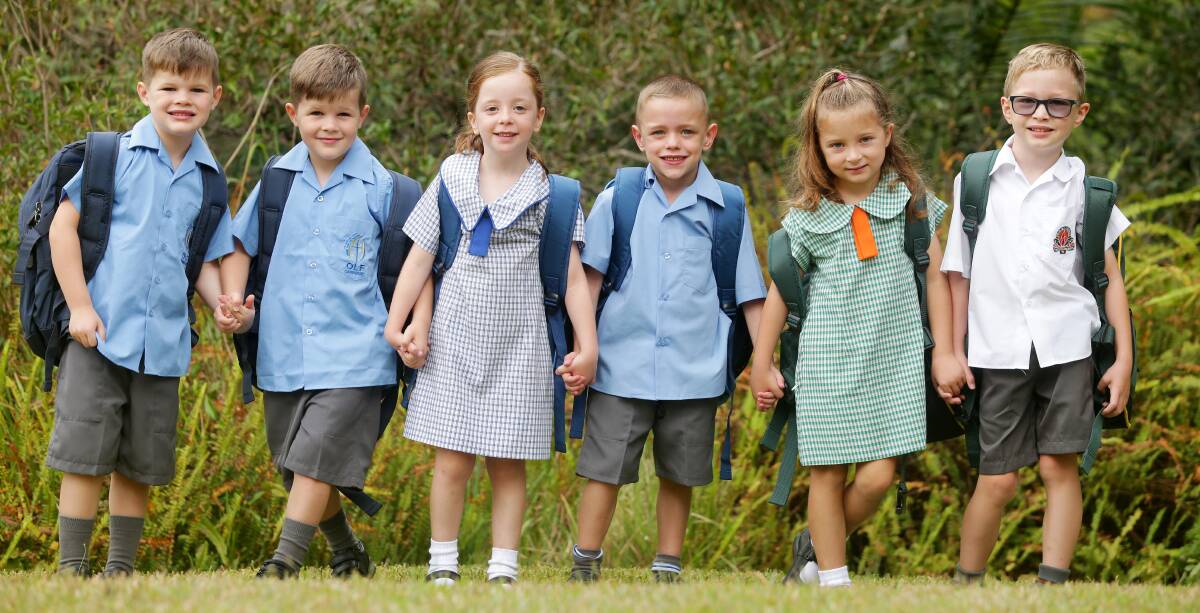 Seeing double: left to right, Joshua, Ethan, Zara, Hayden, Isabella and Dylan are ready for their first day at school. Picture: Chris Lane 