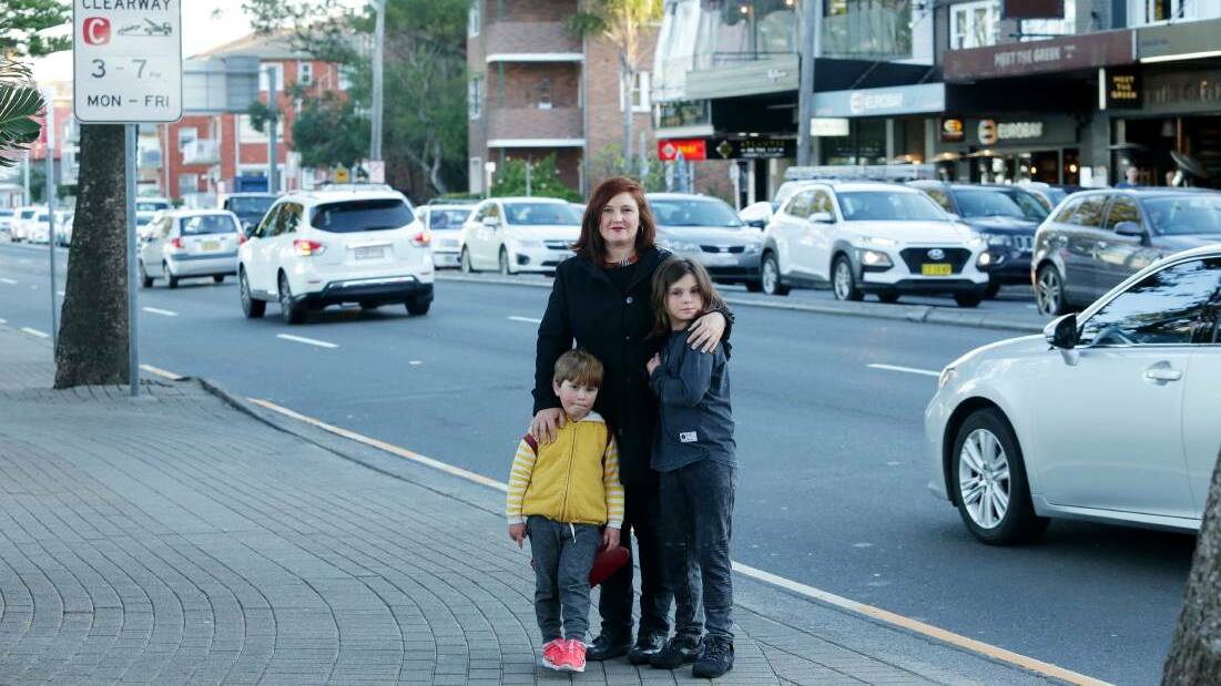 Call to action: Heidi Douglas with her two sons in Bay Street, Brighton-Le-Sands where she was almost run down by a car. Picture: Chris Lane