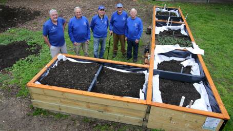 Digging in: Bayside Men's Shed members at the new Rockdale Community Garden, from left Steve, Oscar, Fred, Louis and George. Picture: John Veage