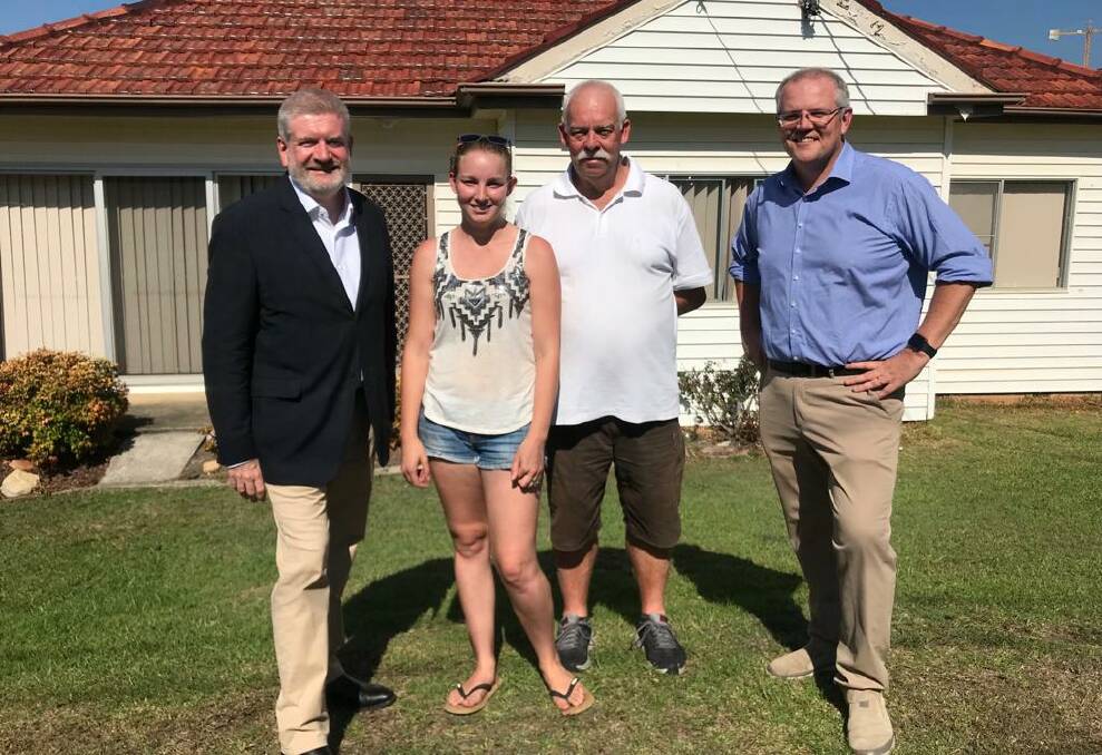 Miranda launch: from left, Mitch Fifield, with Rebecca,one of the first householders to receive the FTTC technology, her father, Scott and Cook MP Scott Morrison.