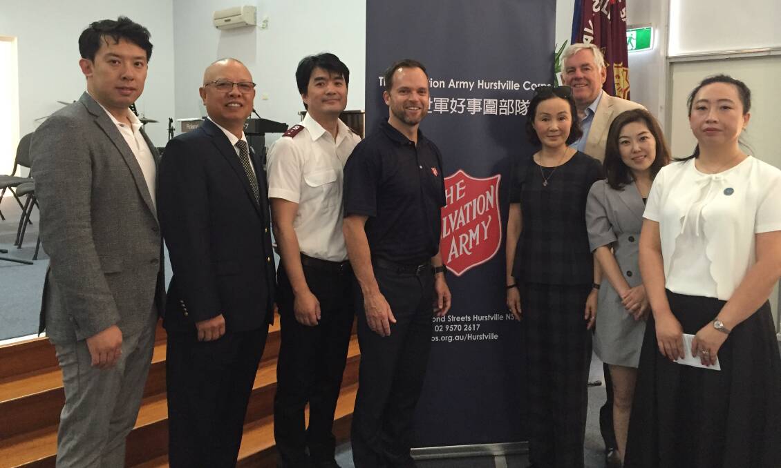 Suppporting the Salvos: from left, Michael Yin and Liang Guo of the ACUBAF, Sean Li of the Salvation Army Hurstville Corp, Andrew Hill Salvation Army's general manager community fundraising, Georges River Councillor Nancy Liu and Mayor Kevin Greene, and Momo Zhang and Lina Zhao of ACUBAF.