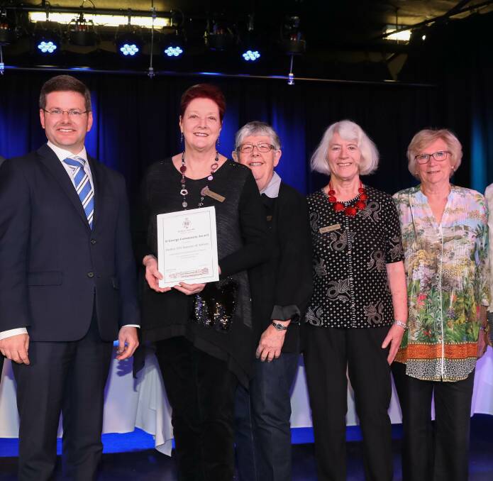 Mark Coure with members of the Oatley 101 Society of Arts at the St George Community Awards night in November last year, Geraldine Taylor, Shirley Hagarty, Robyn Riley and Freda Surgenor.