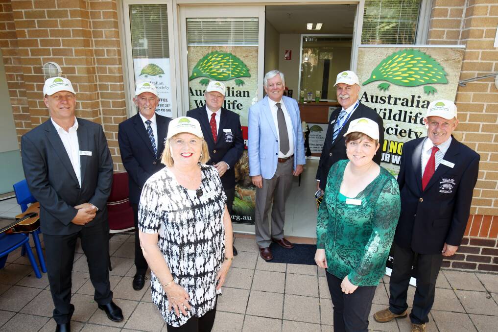 President of the Australian Wildlife Society, Suzanne Medway (front left) with Georges River Council mayor Kevin Greene (centre, rear) and society members at the opening of the society's new national office at Hurstville. Picture: Chris Lane